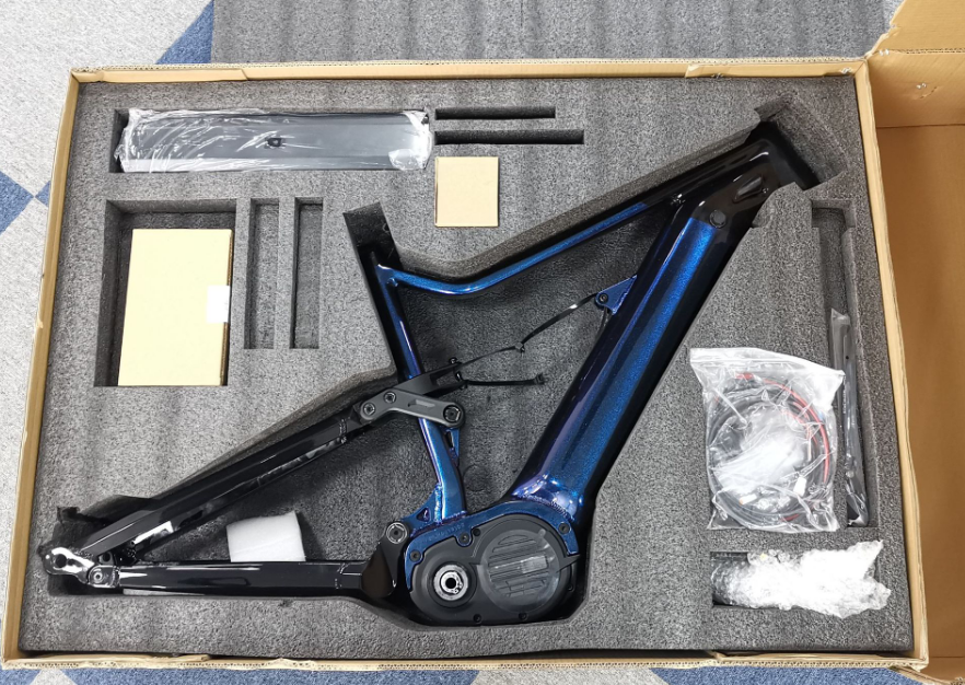 Bafang electric bicycle parts and accessories, various components arranged on workbench